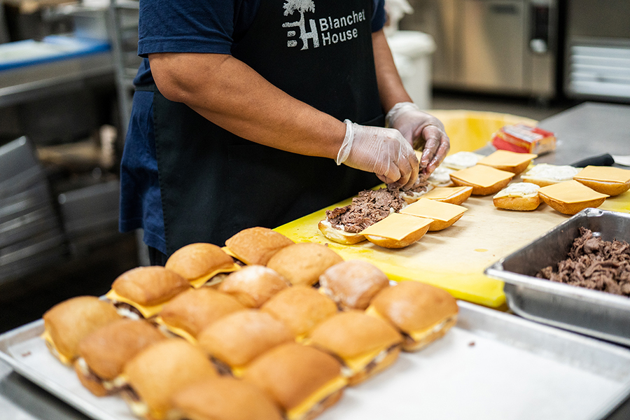 Chef making sandwiches Feed Houseless Food Safety