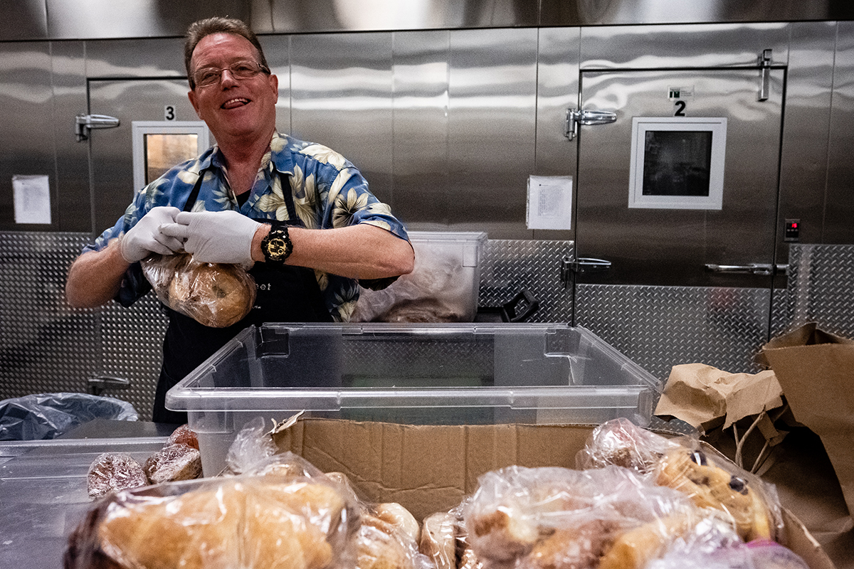 Curtiss sorting donated food at Blanchet House of Hospitality in Portland, Oregon.