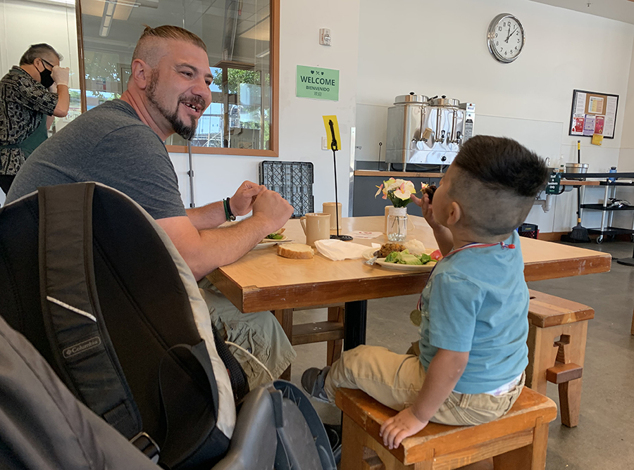 Homeless family eat in soup kitchen optimism solves homelessness