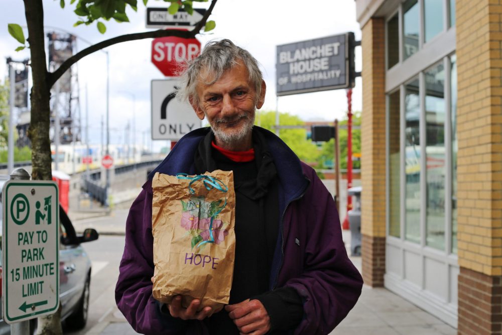 Michael Angel waits for a meal outside of Blanchet House_credit Julie Showers