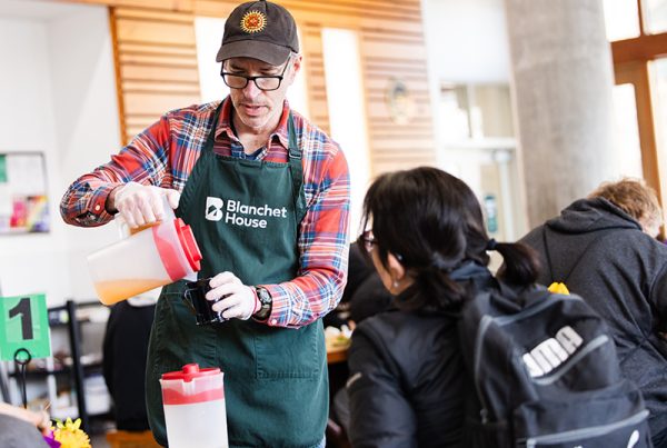 Volunteer Work Blanchet House cafe pouring drinks